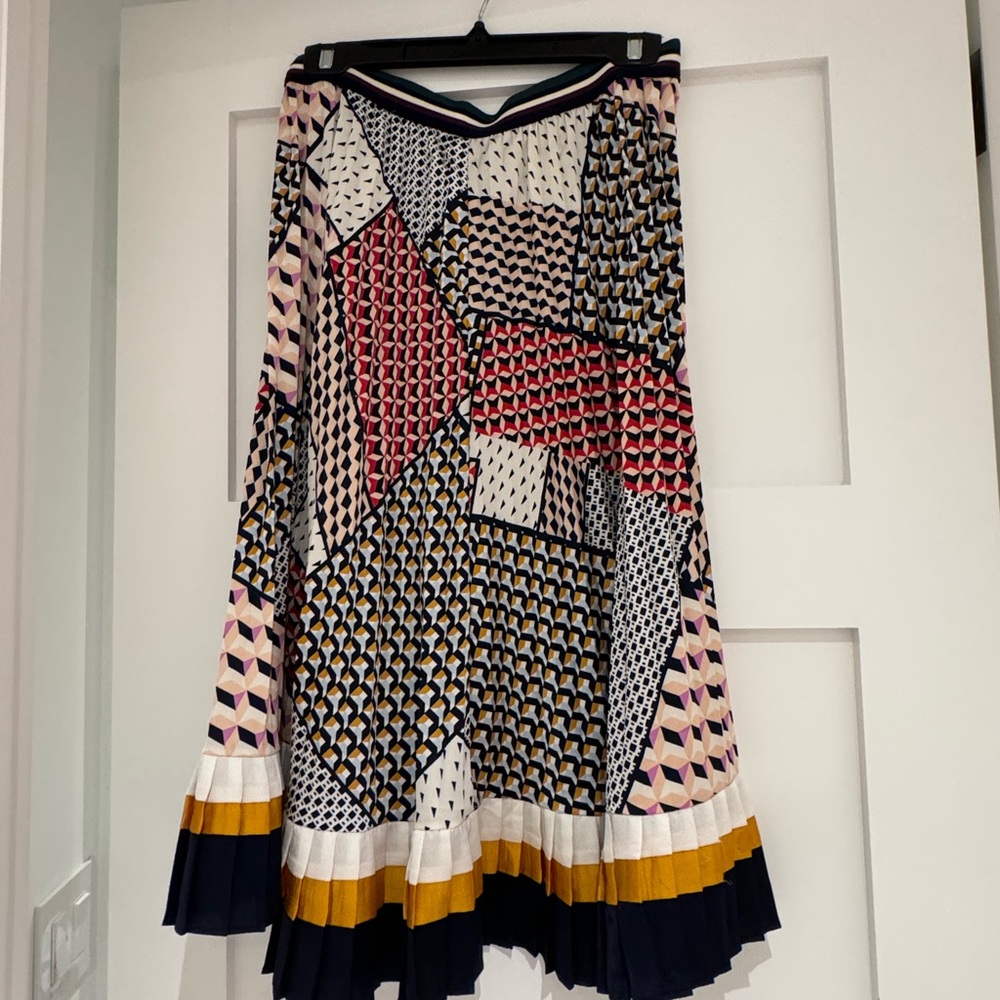 Colourful pleated skirt.